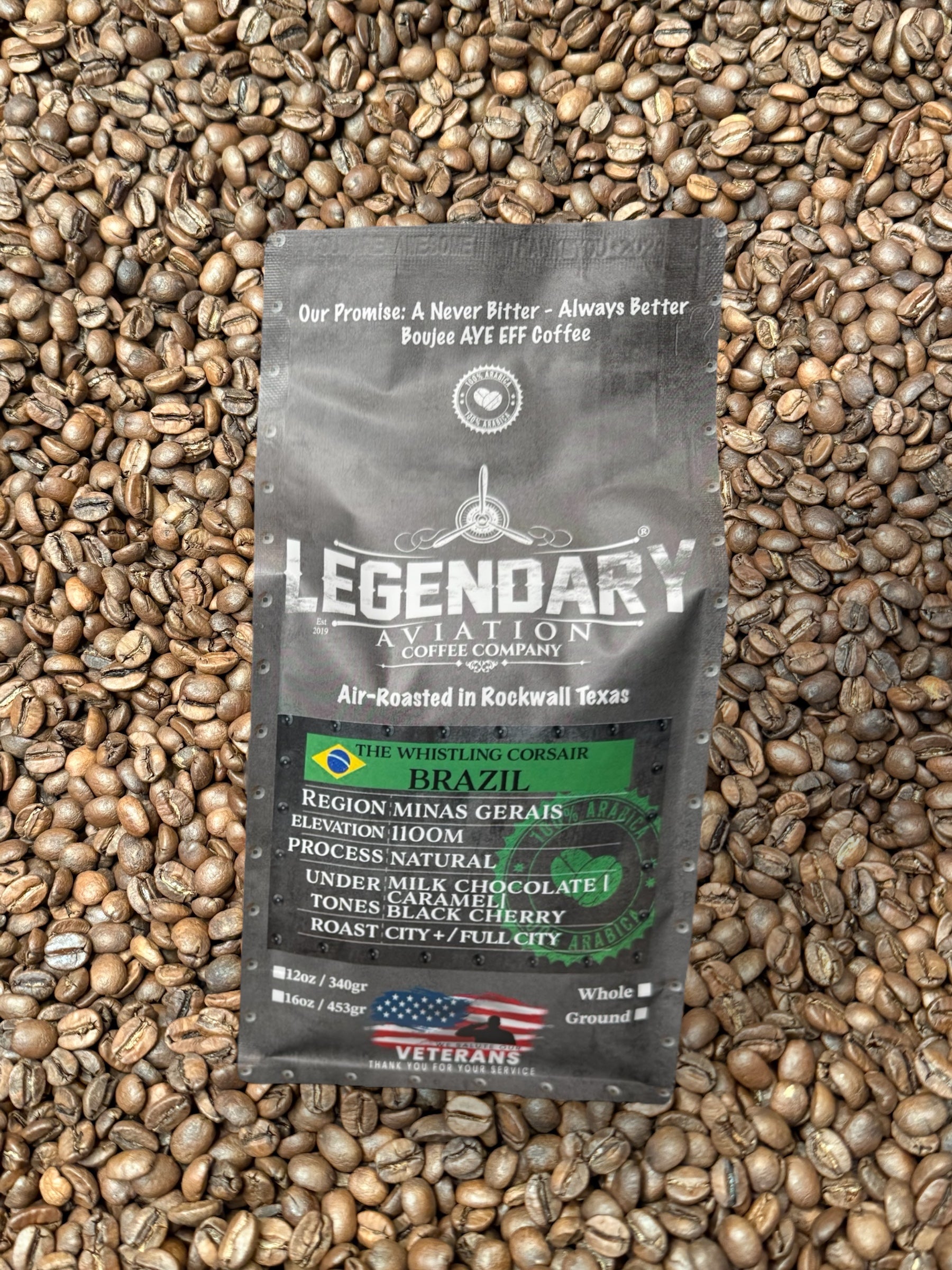 Front view of The Whistling Corsair coffee bag in coffee beans by Legendary Aviation Coffee Company, showcasing premium Brazilian coffee from Minas Gerais with notes of milk chocolate, caramel, and black cherry. Air-roasted specialty coffee in Rockwall, Texas.