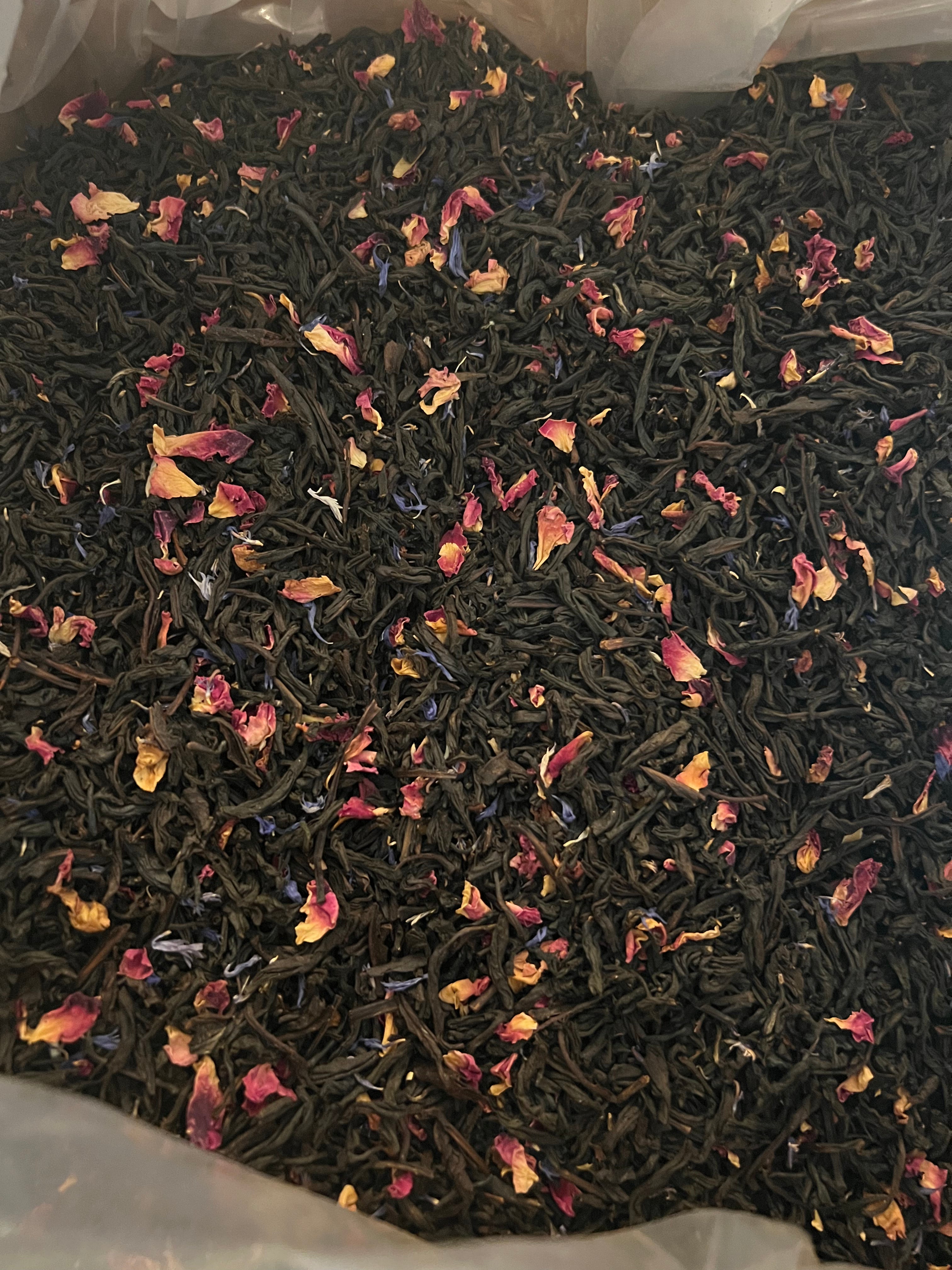 Ingredients of Savannah Belle tea blend: black tea, red rose petals, blue cornflowers, cranberry flavor, peach flavor, and orange flavor. Legendary Aviation Coffee in Rockwall Texas