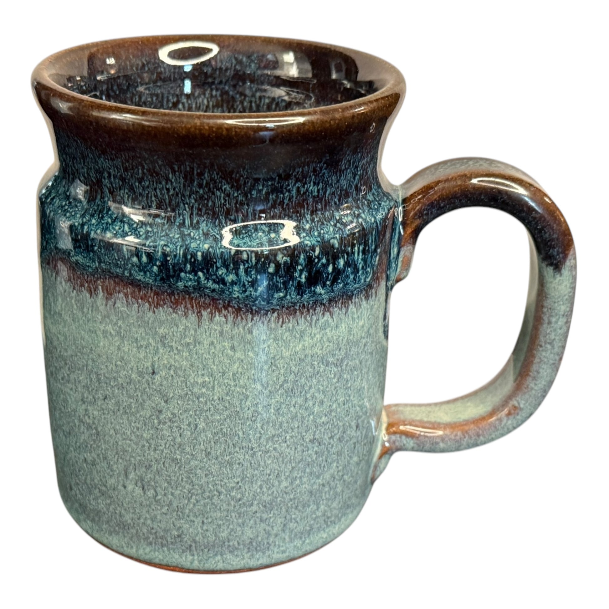 Close-up of the Middle Finger Mug’s handle, showcasing its sturdy design and hand-glazed finish by Sunset Hill Stoneware, available at Legendary Aviation Coffee in Rockwall, Texas.